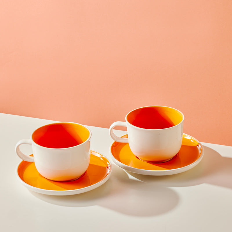 http://www.arakucoffee.com/cdn/shop/files/lot-2-tasses-cappucino-araku-orange.jpg?v=1705921562