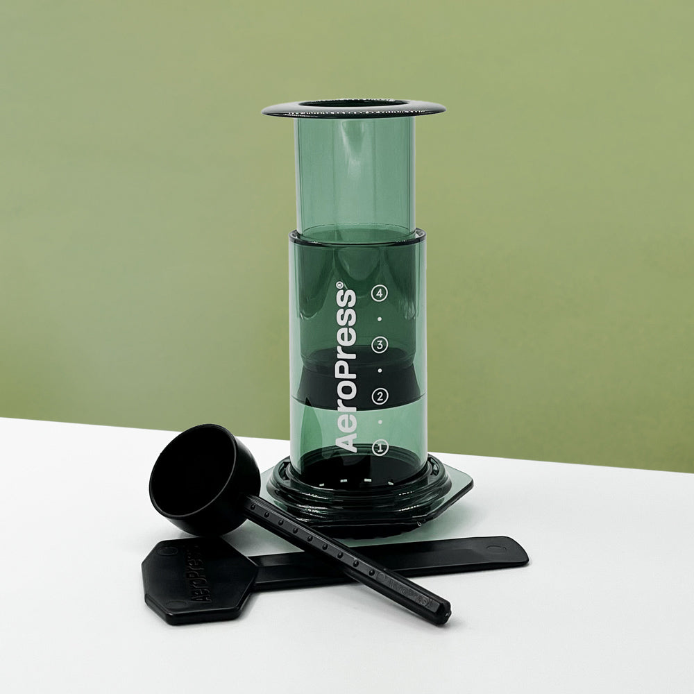 AeroPress Clear verte en matériau Tritan incassable, méthode douce pour café de spécialité à la maison ou en déplacement.